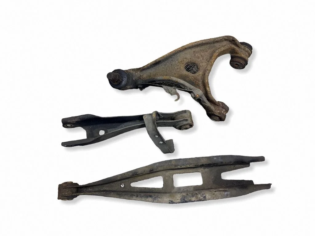 Rear upper control arm/wishbone – left