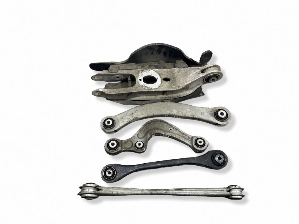 Rear upper control arm/wishbone – left