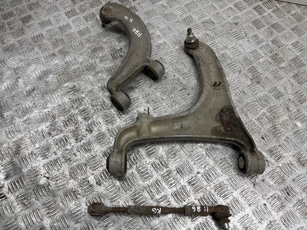 Rear upper control arm/wishbone – left