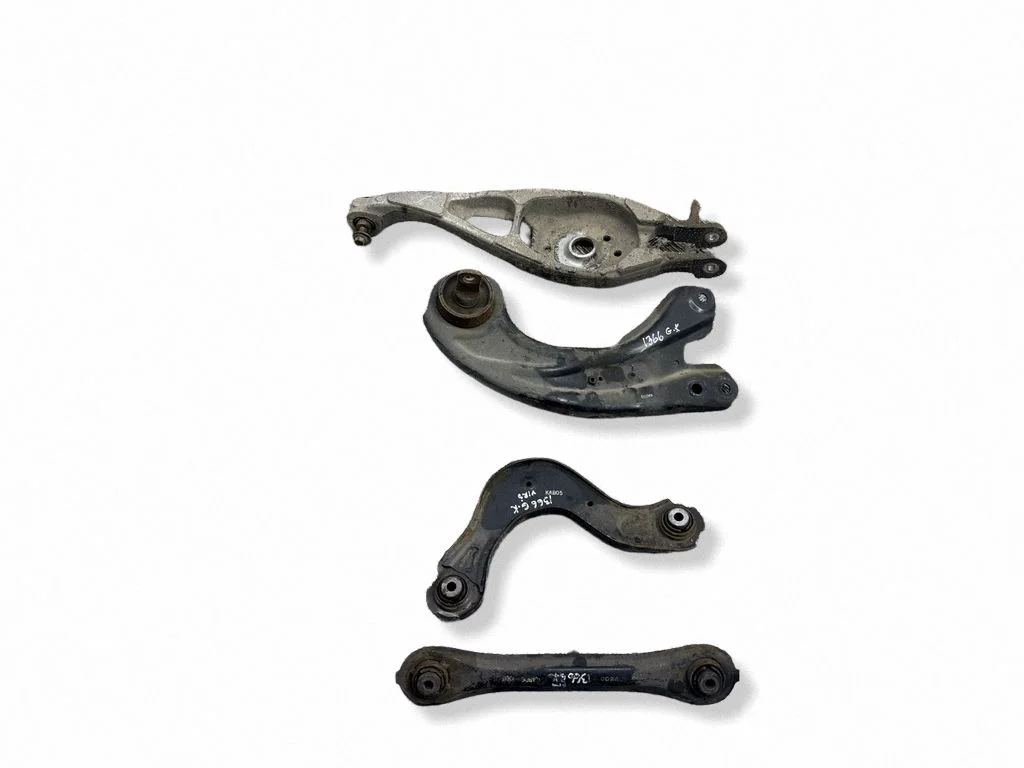 Rear upper control arm/wishbone – left