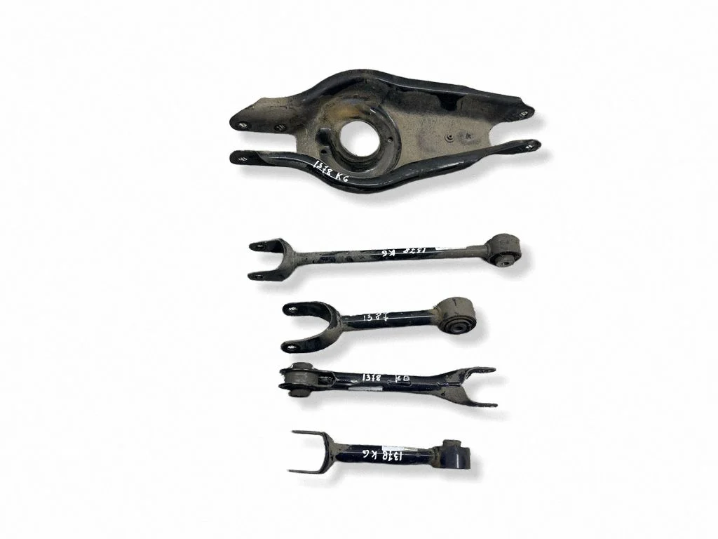 Rear upper control arm/wishbone – left