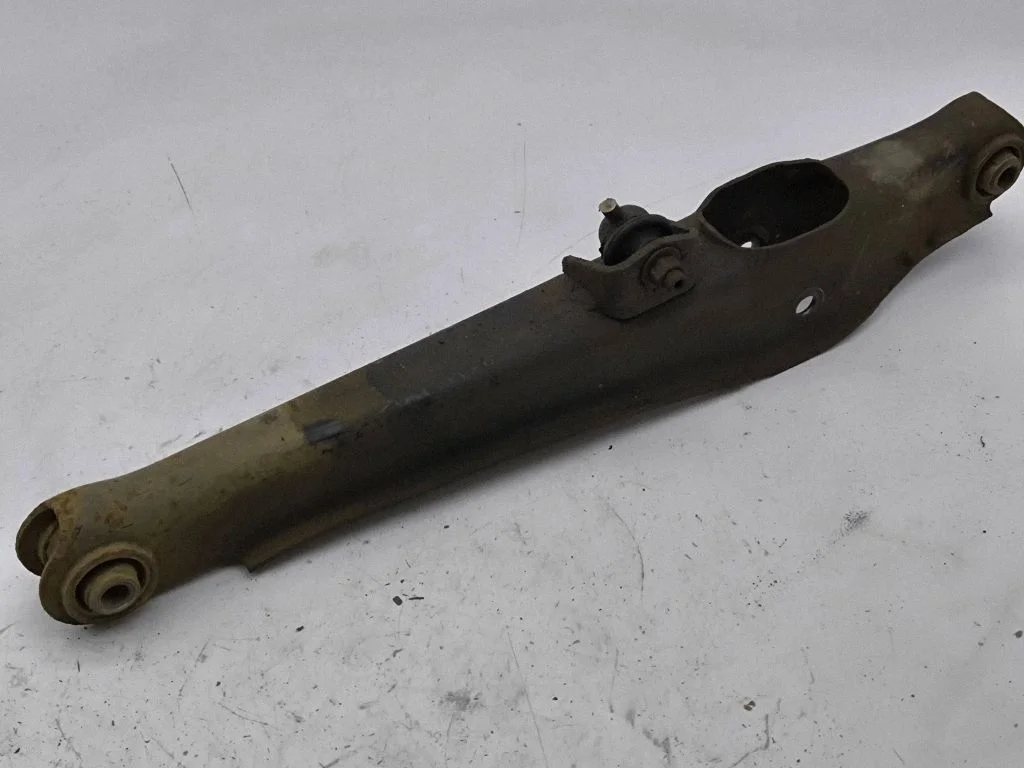 Rear upper control arm/wishbone – left