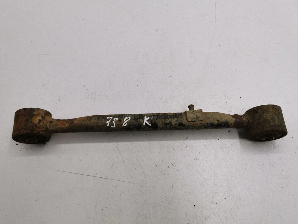 Rear upper control arm/wishbone – left