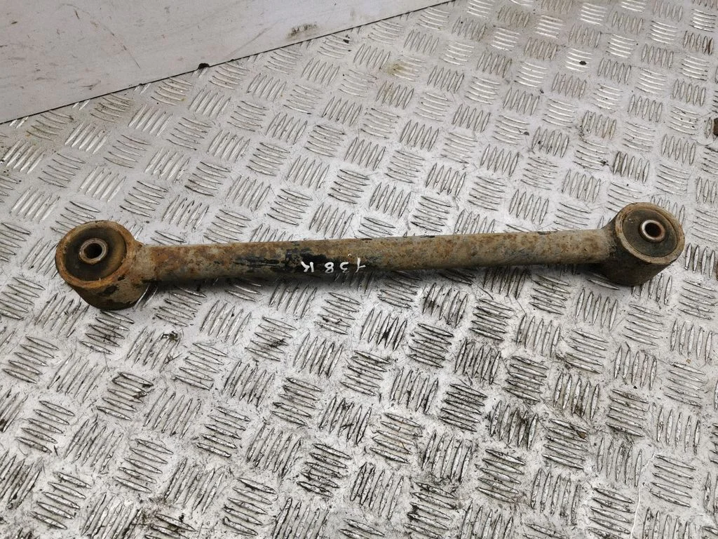 Rear upper control arm/wishbone – left