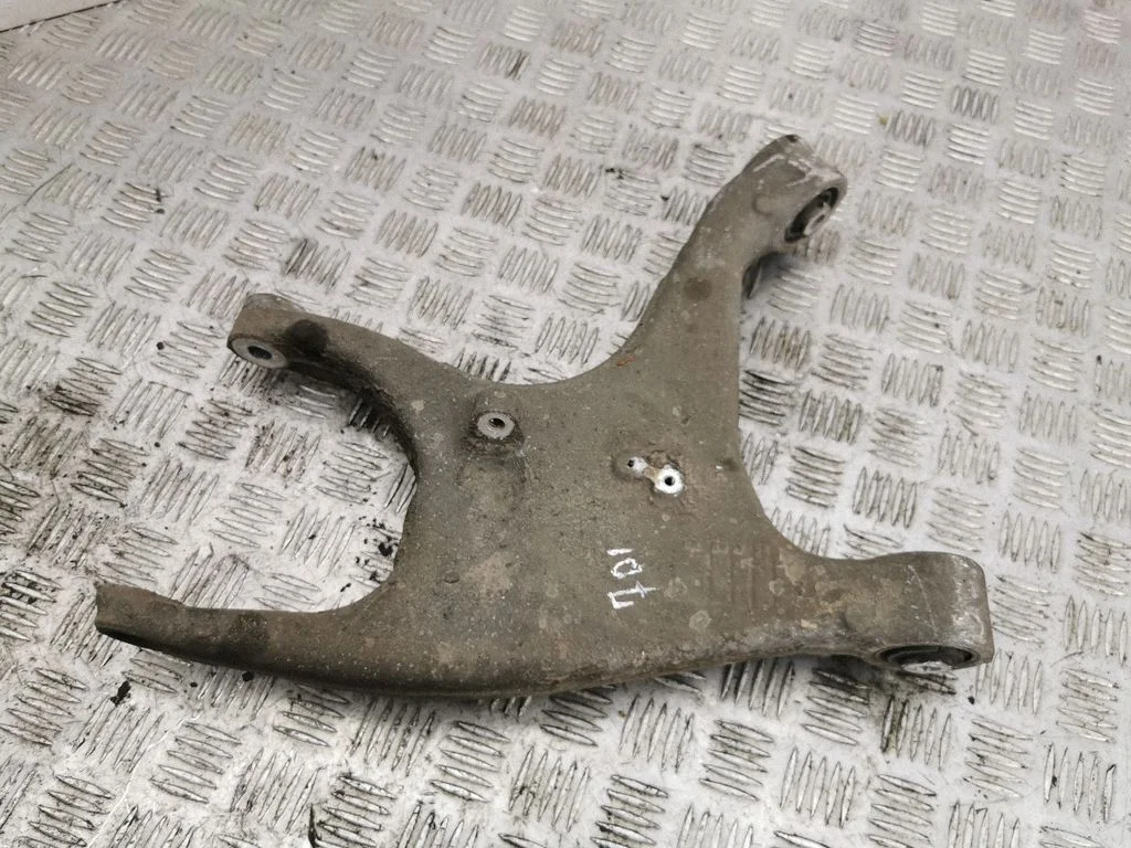 Rear upper control arm/wishbone – left