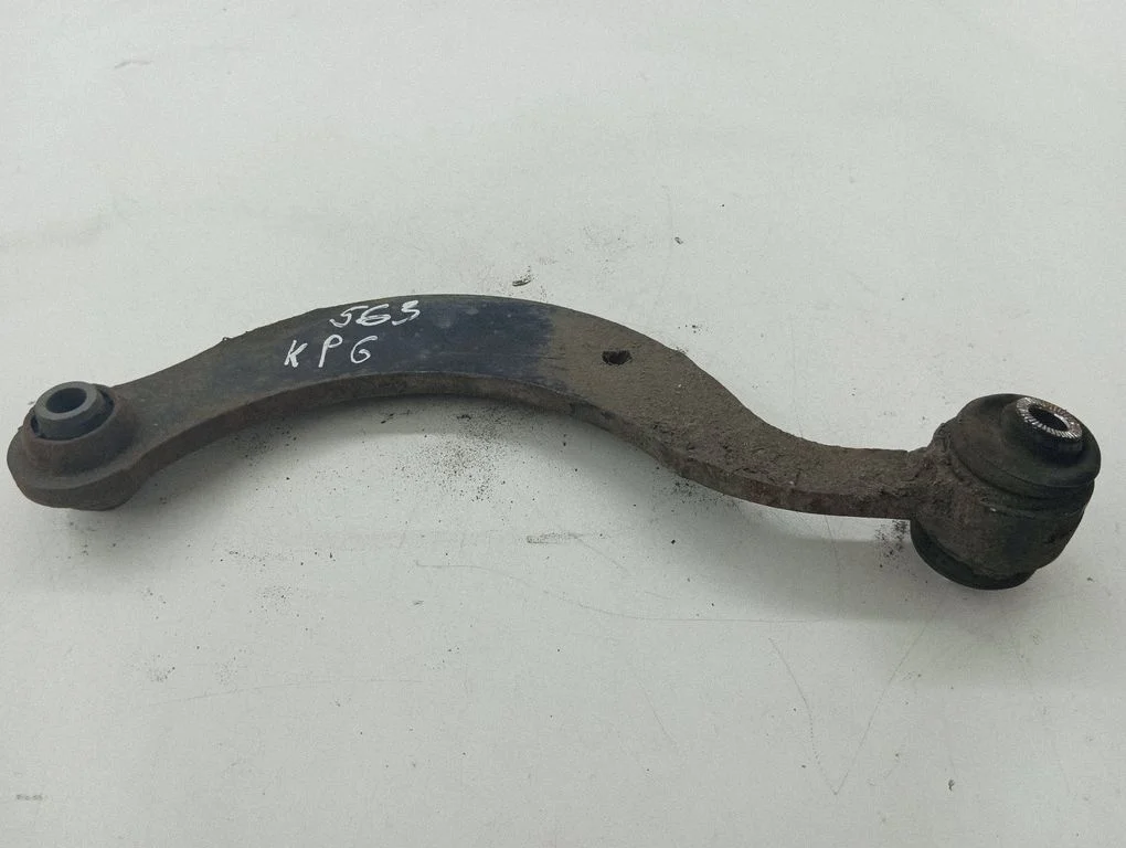 Rear upper control arm/wishbone – left