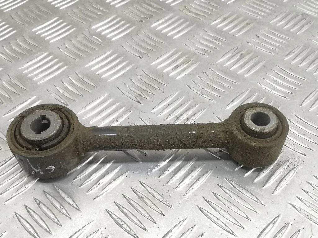 Rear upper control arm/wishbone – left