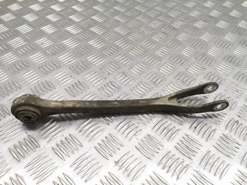 Rear upper control arm/wishbone – left