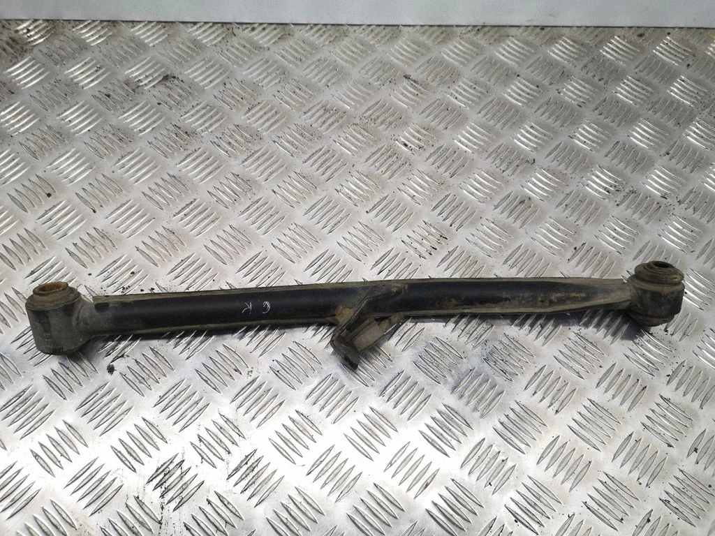 Rear upper control arm/wishbone – left