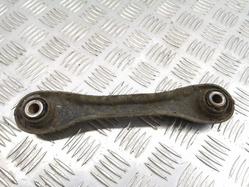 Rear upper control arm/wishbone – left