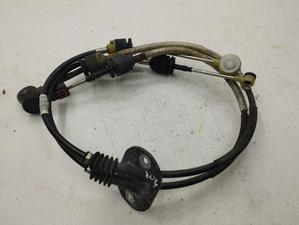 Gear shift cable linkage AV6R7E395GA