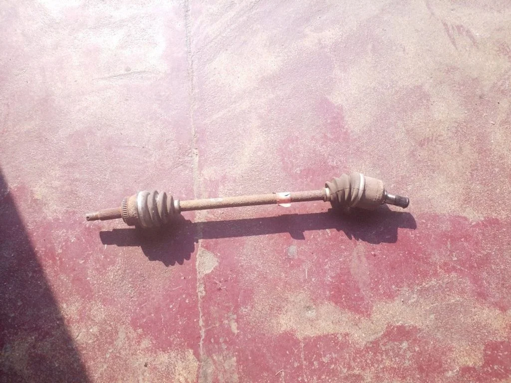 Rear driveshaft – left