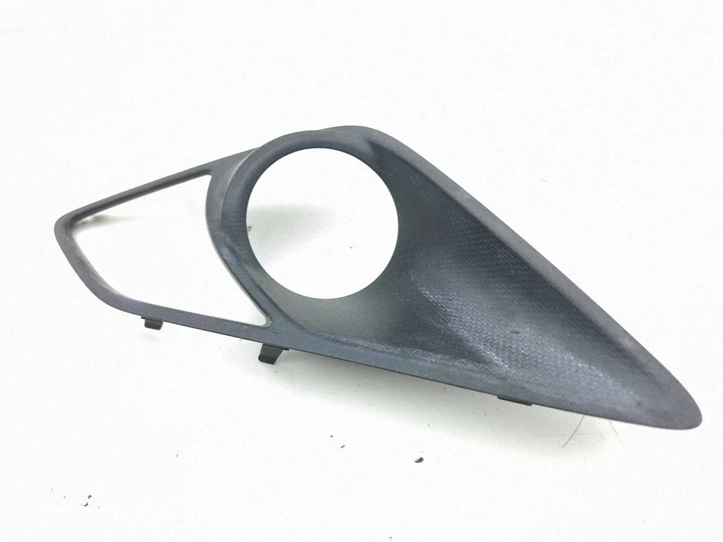 Front fog light trim/grill 57731CA030