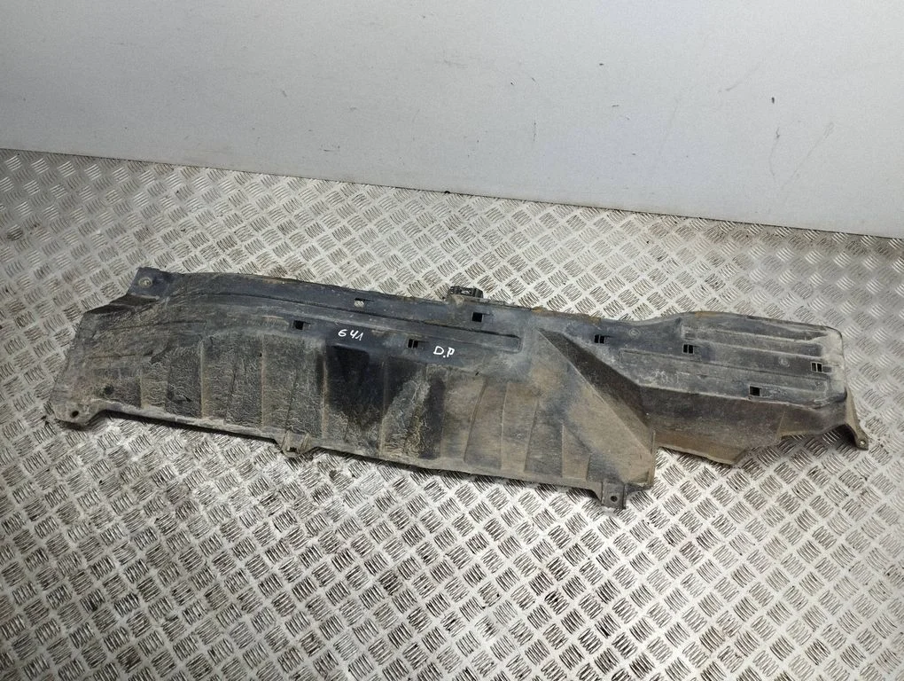 Center/middle under tray cover – right