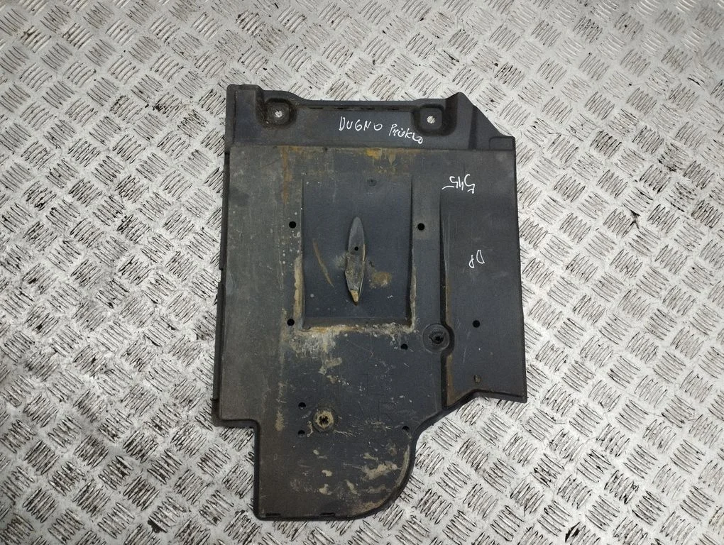 Center/middle under tray cover – front right