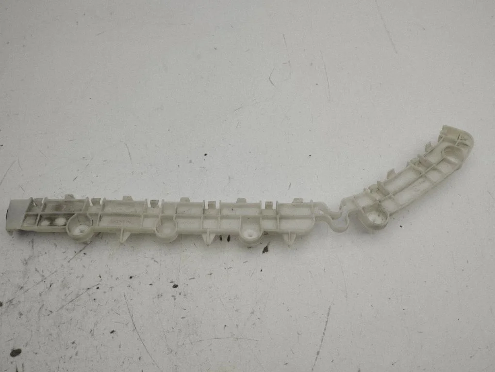 Rear bumper mounting bracket – left