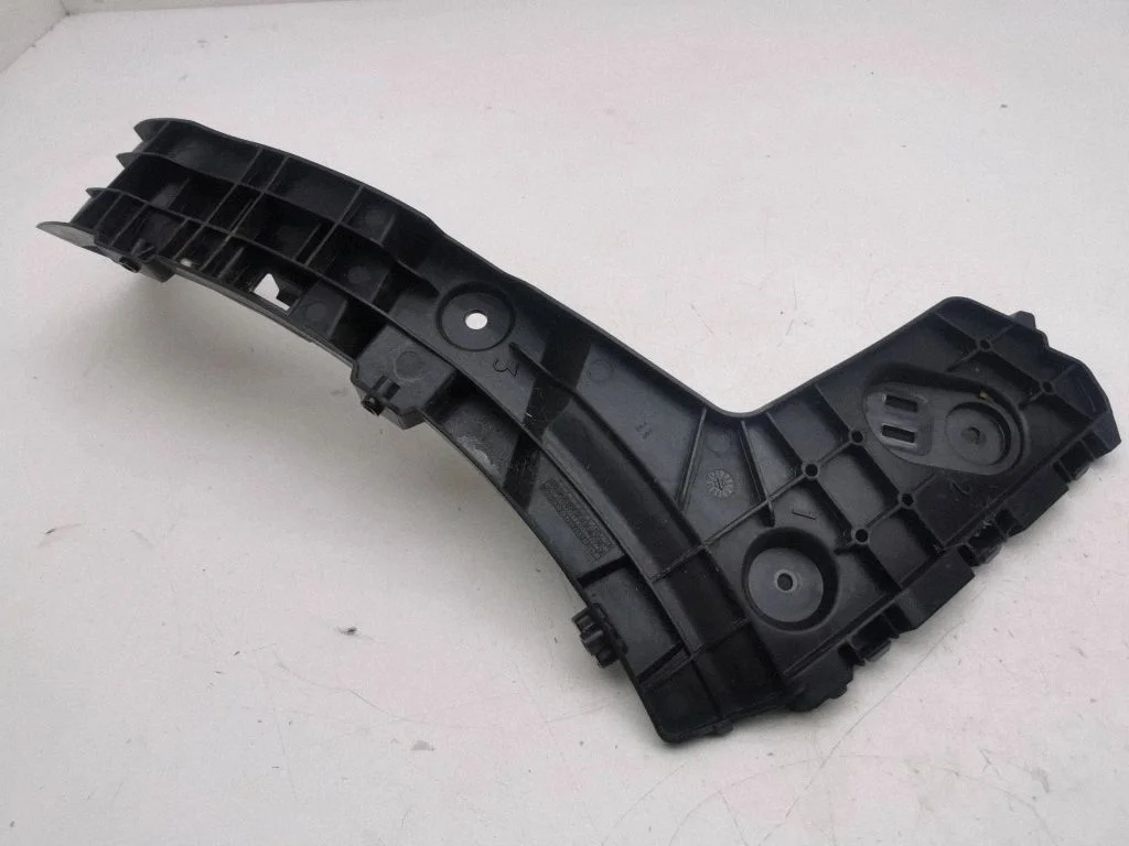 Rear bumper mounting bracket 81A07254