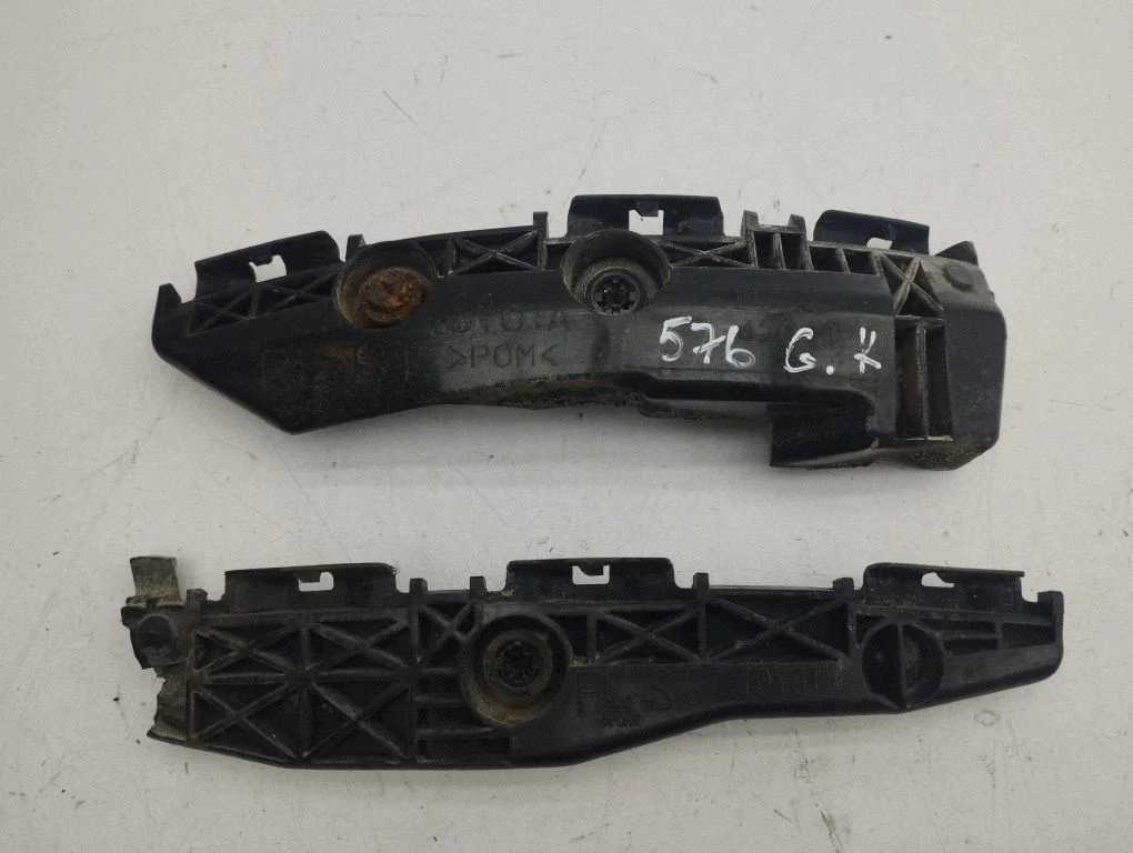 Rear bumper mounting bracket – left