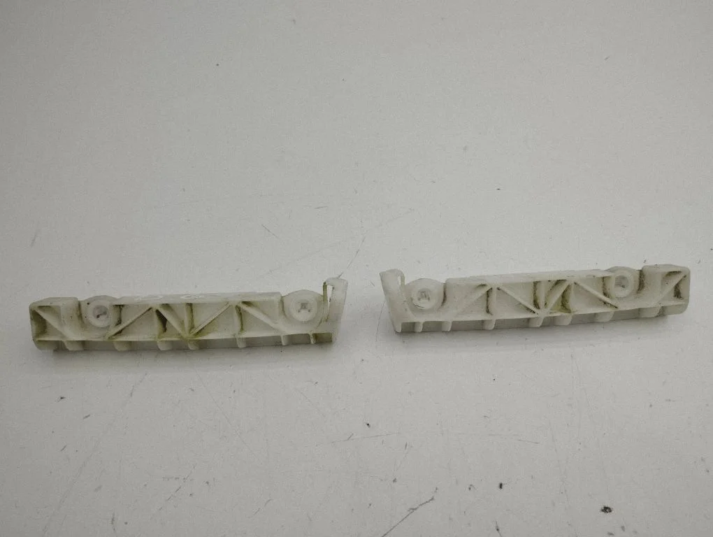 Rear bumper mounting bracket