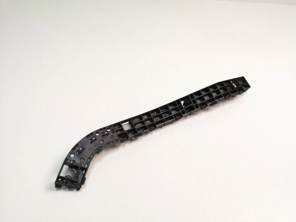 Rear bumper mounting bracket – left