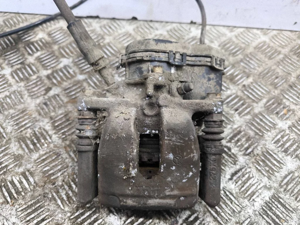 Rear brake caliper – right