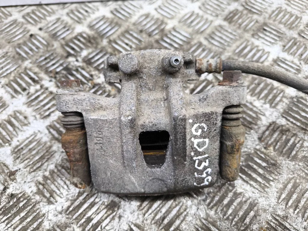 Rear brake caliper – right