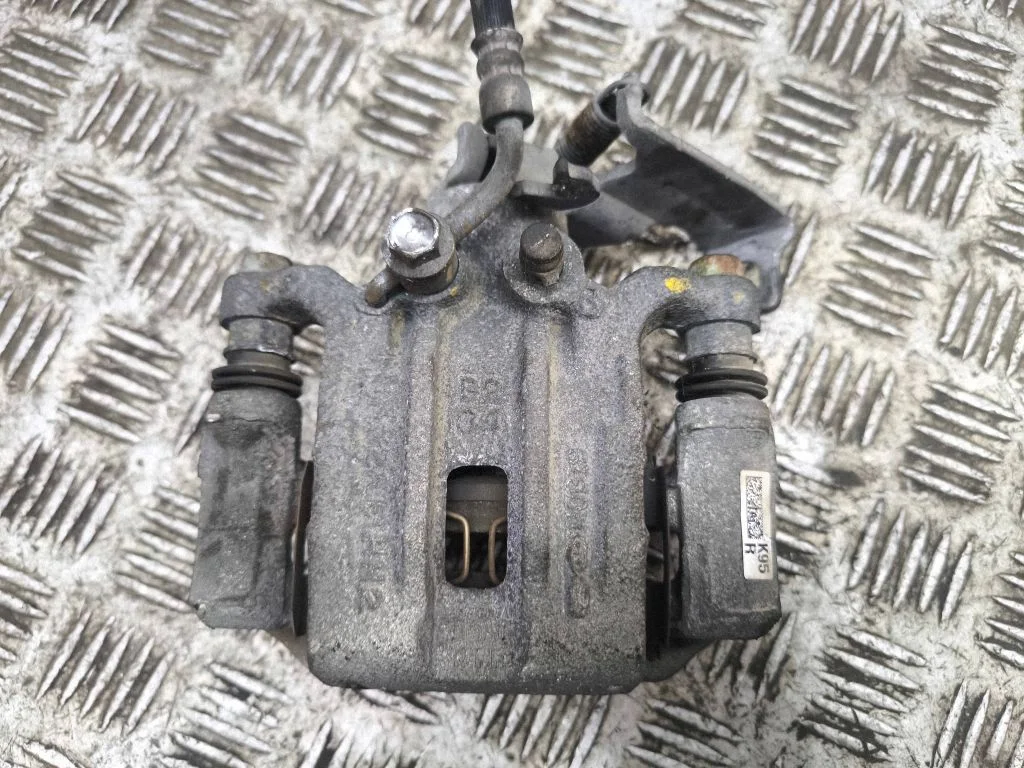 Rear brake caliper – right