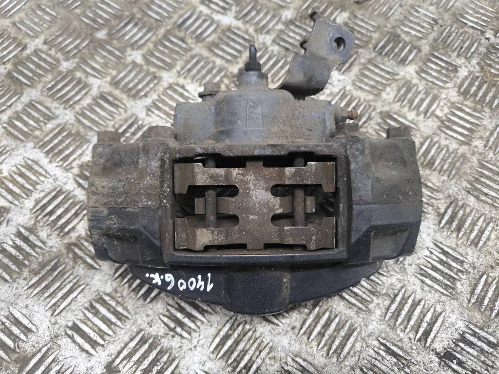 Rear brake caliper – left