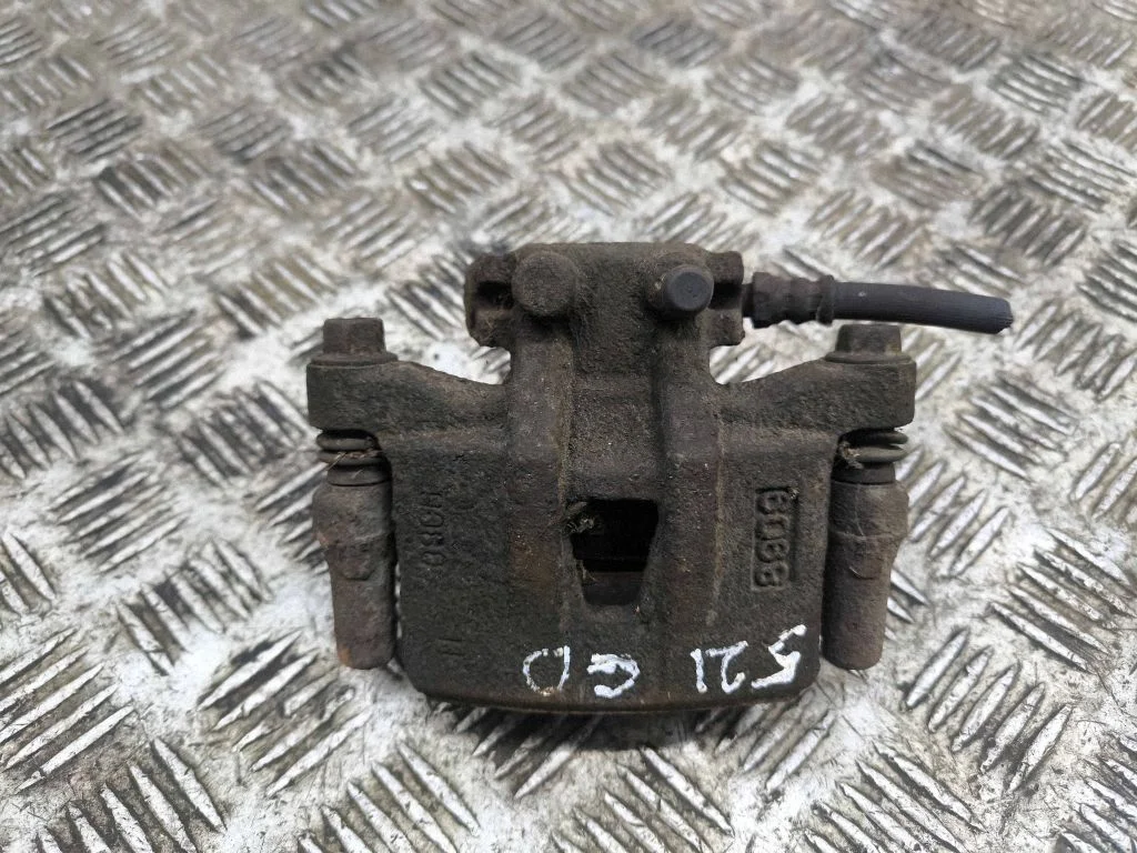 Rear brake caliper – right