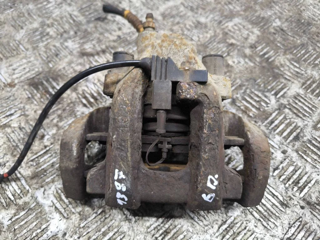 Rear brake caliper – right