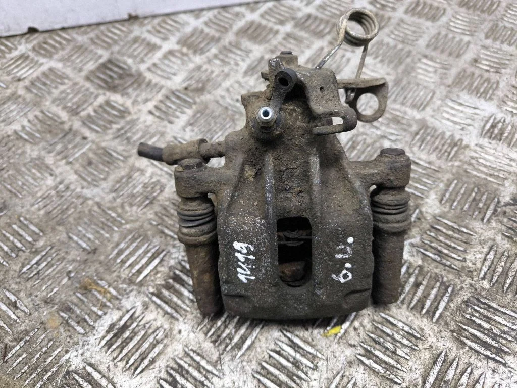 Rear brake caliper – right