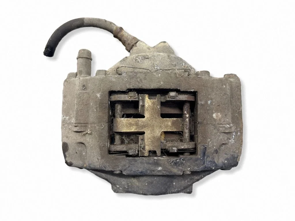 Rear brake caliper – left