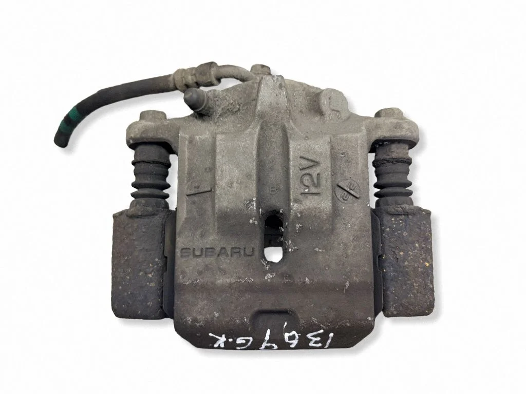 Rear brake caliper – left
