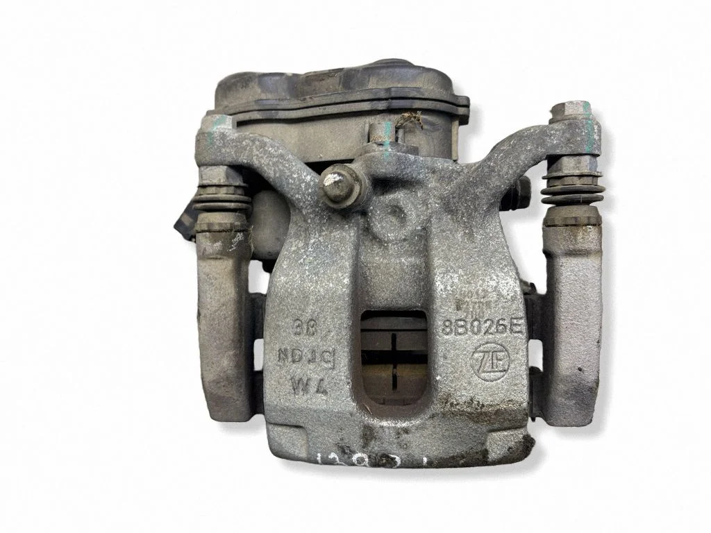Rear brake caliper – left