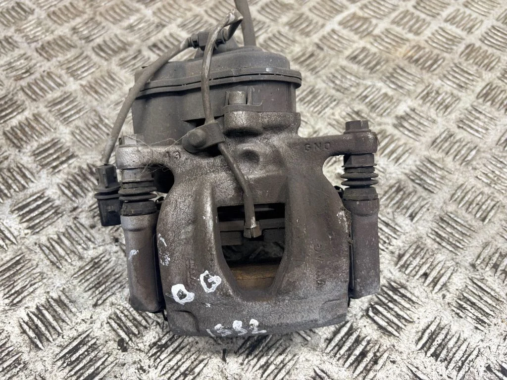 Rear brake caliper – right