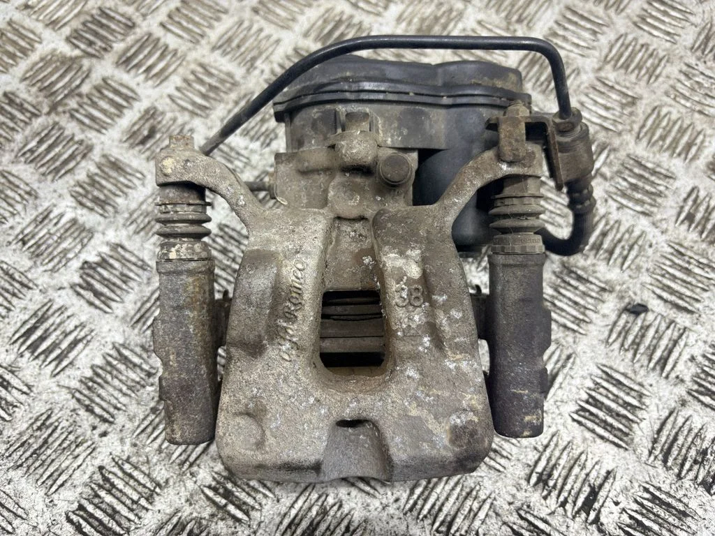Rear brake caliper – right