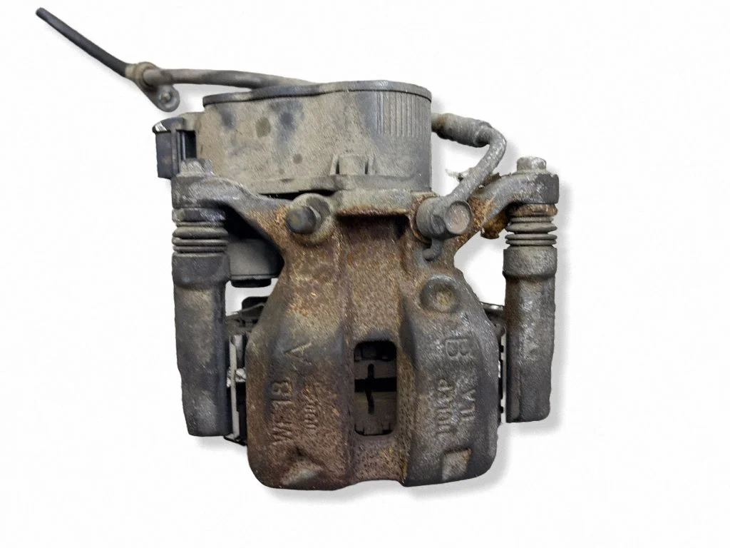 Rear brake caliper – left