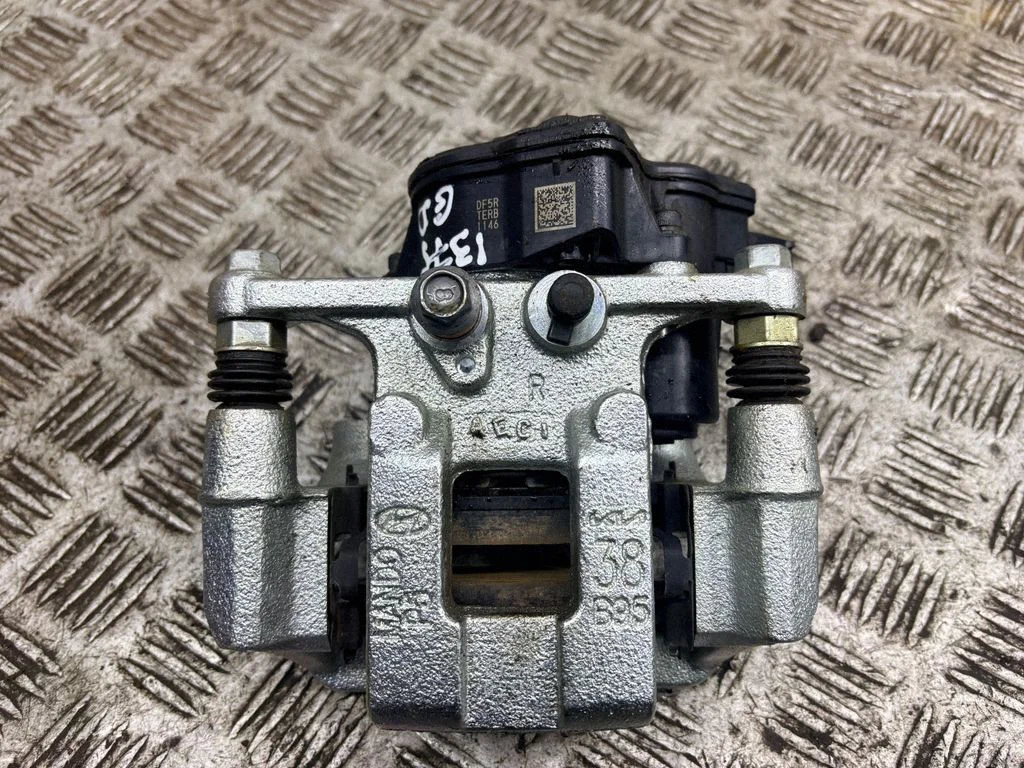 Rear brake caliper – right