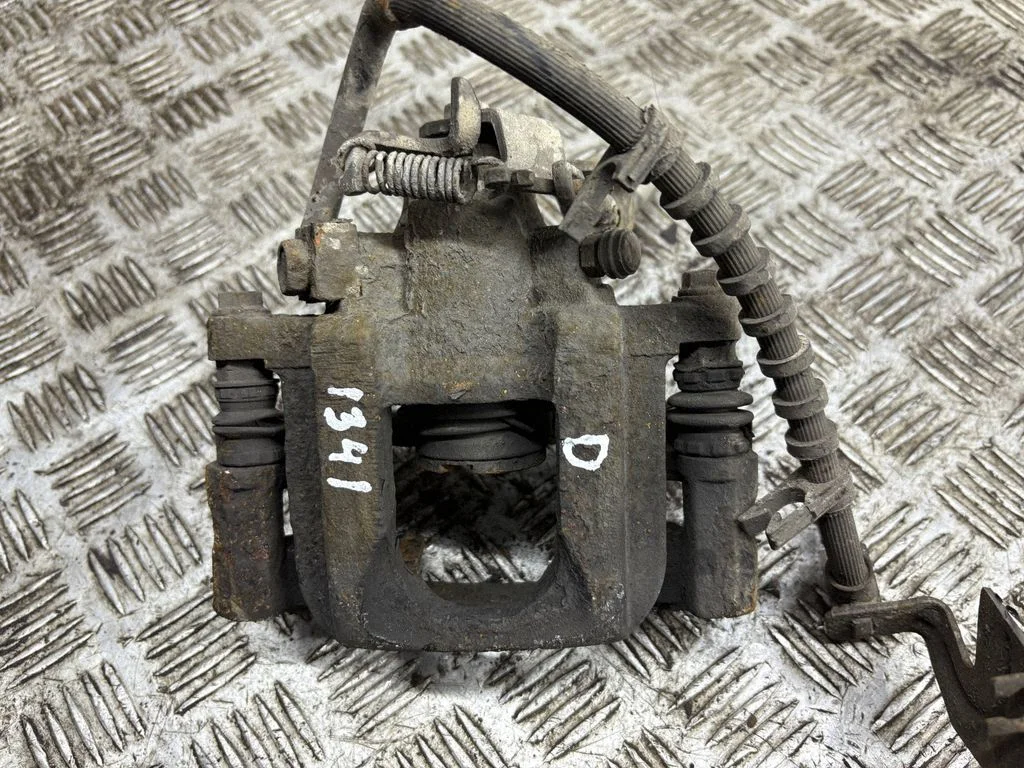 Rear brake caliper – right