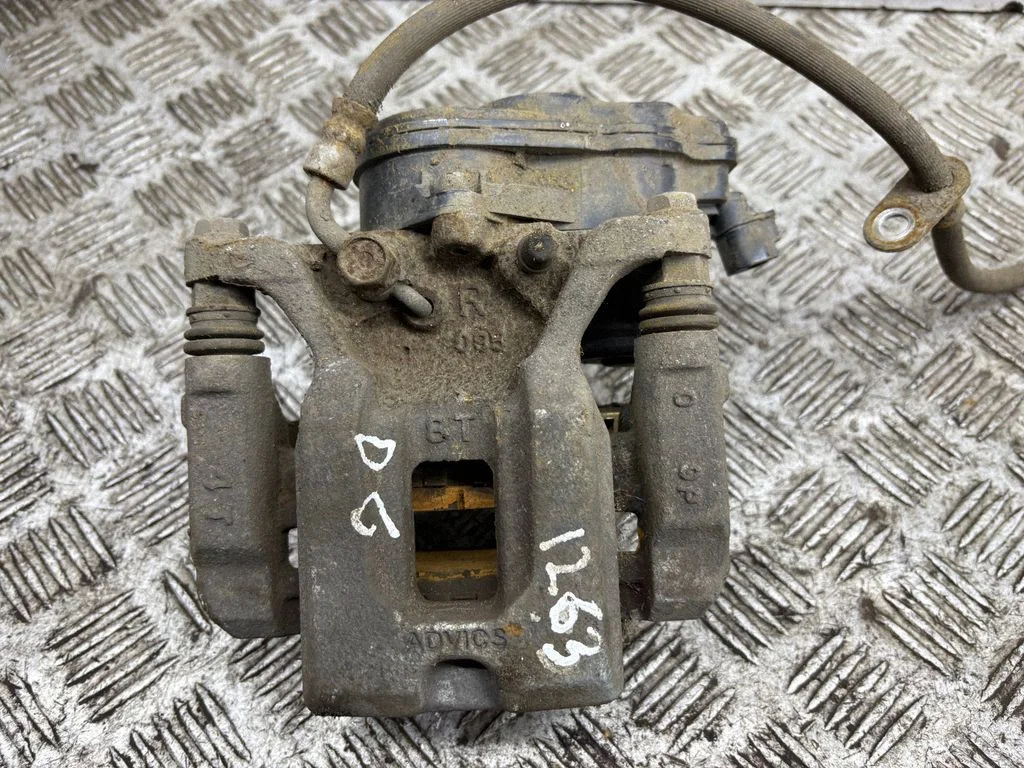 Rear brake caliper – right