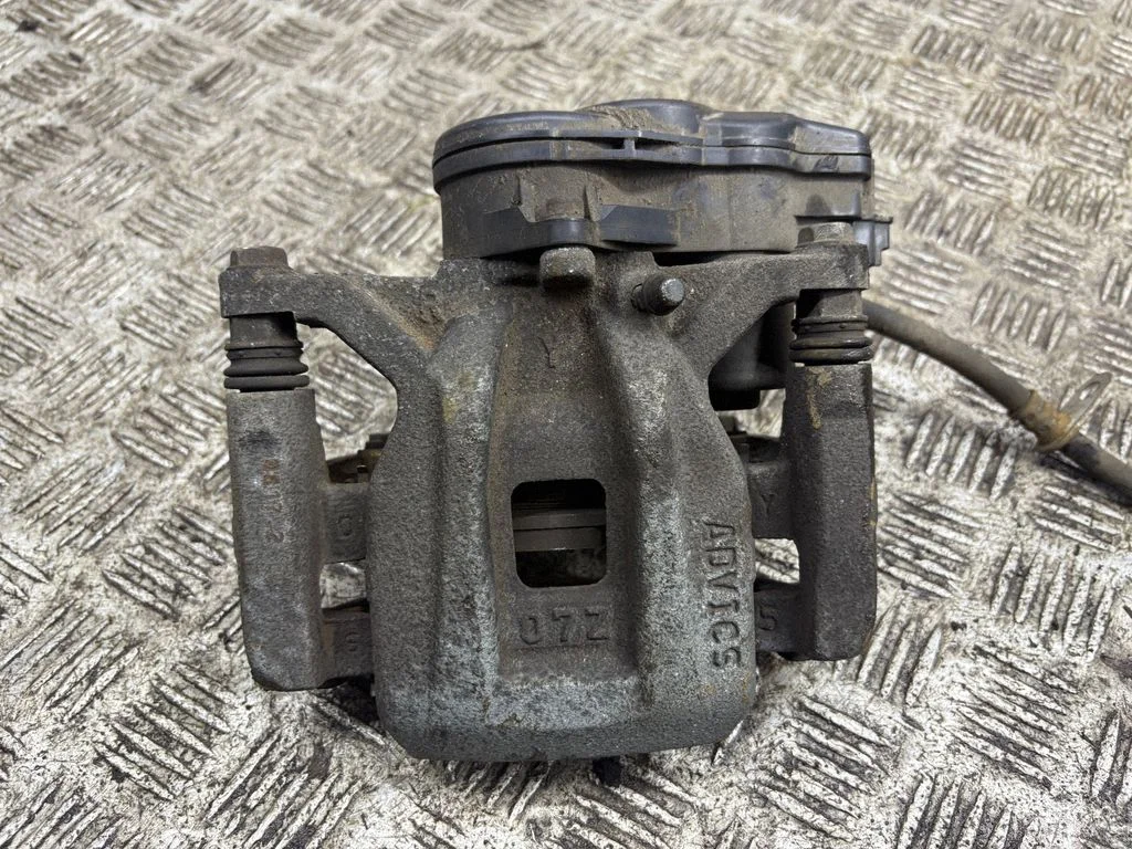 Rear brake caliper – right