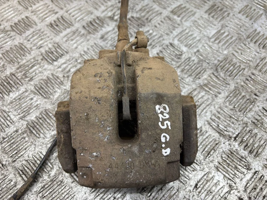 Rear brake caliper – right