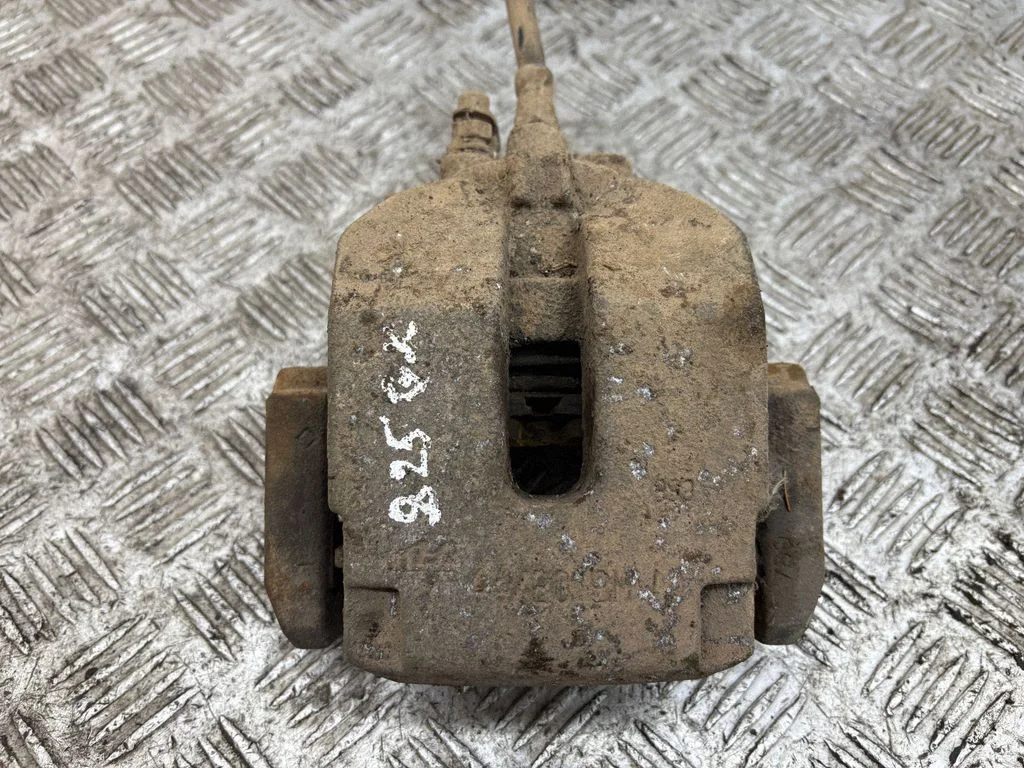 Rear brake caliper – left
