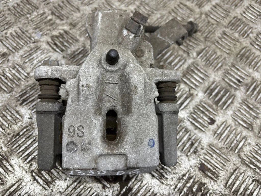 Rear brake caliper – right