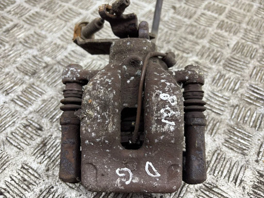 Rear brake caliper – right