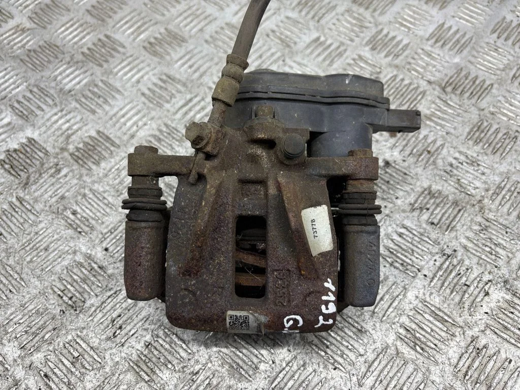 Rear brake caliper – right
