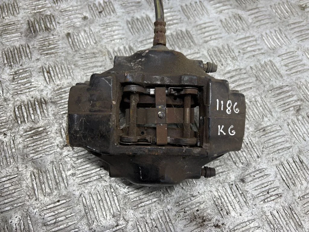 Rear brake caliper – left