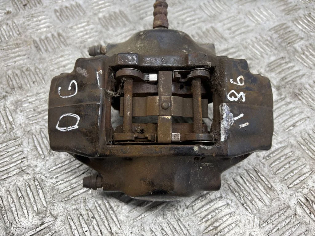 Rear brake caliper – right