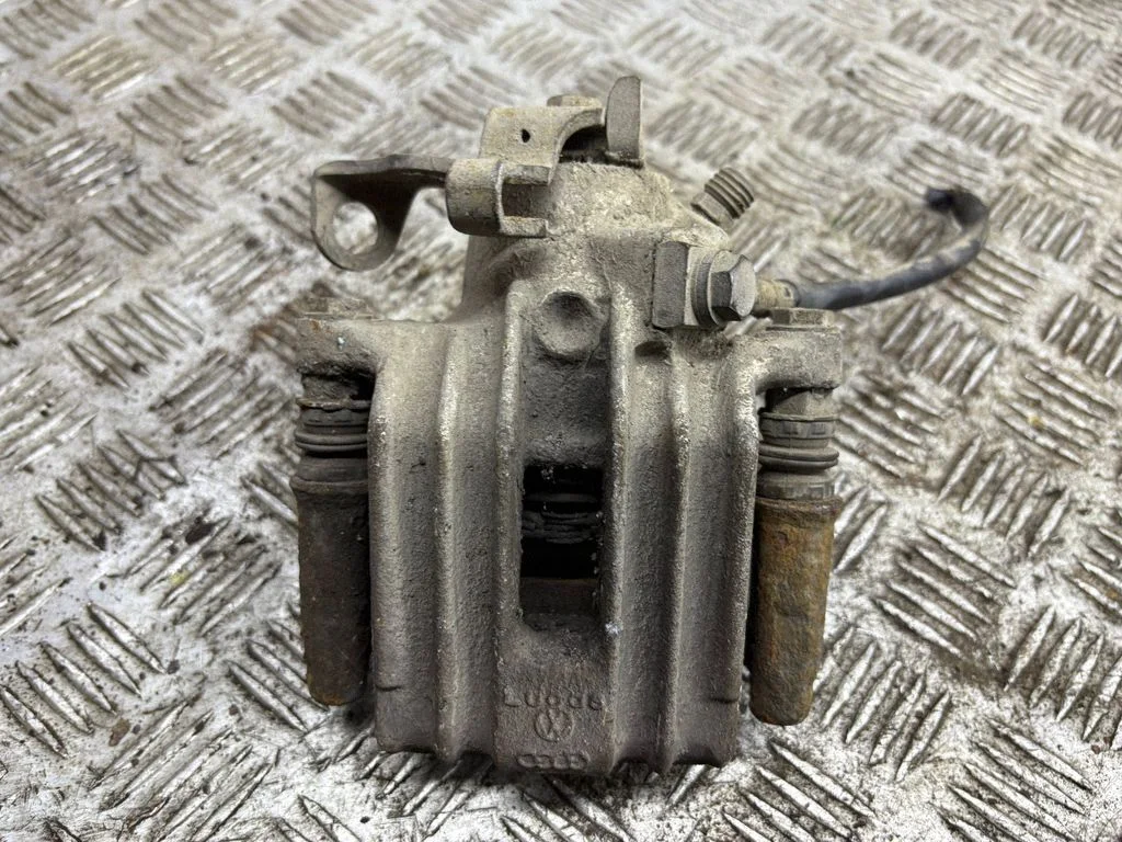 Rear brake caliper – right