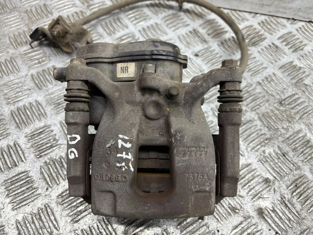 Rear brake caliper – right